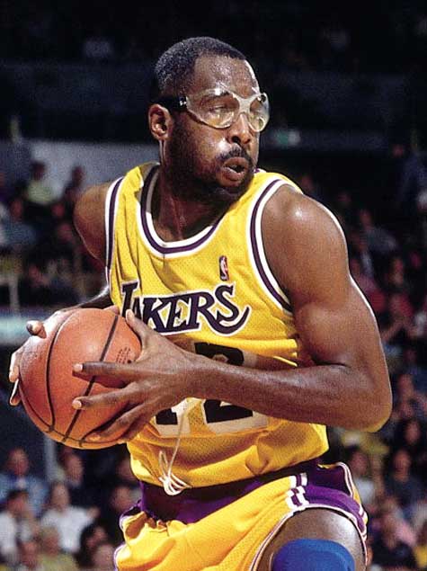 James Worthy grabs a rebound